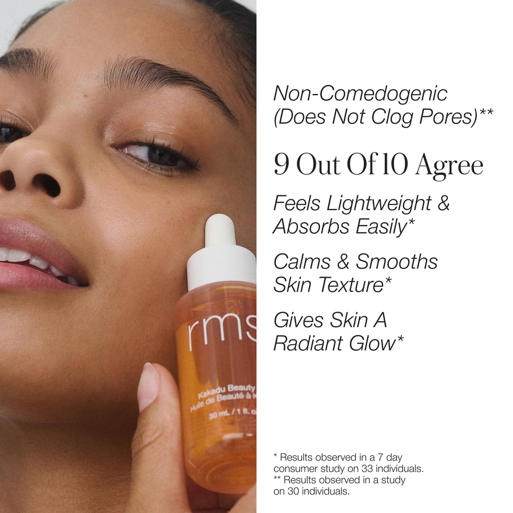 RMS Beauty bottle held next to fingers to illustrate compact size