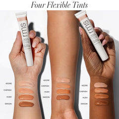 RMS Beauty tube in hand to show 0.5 oz size and travel-friendly scale