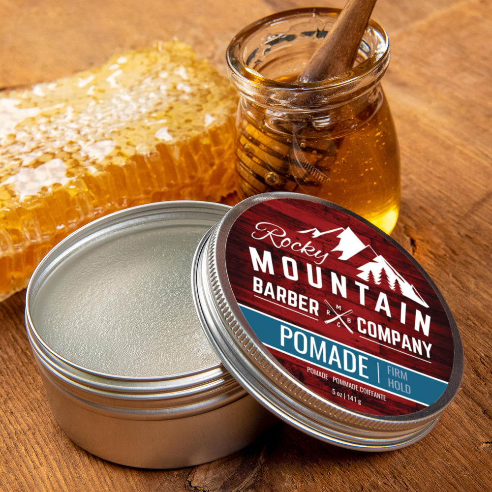 Rocky Mountain Barber Company next to smaller tins showing 5oz value and longer use