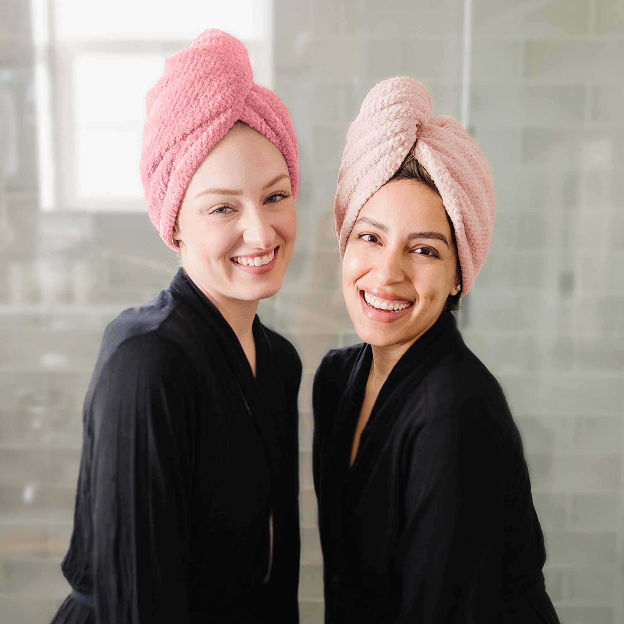 ROLSHOL towel held next to hand to show extra-large 29-inch coverage