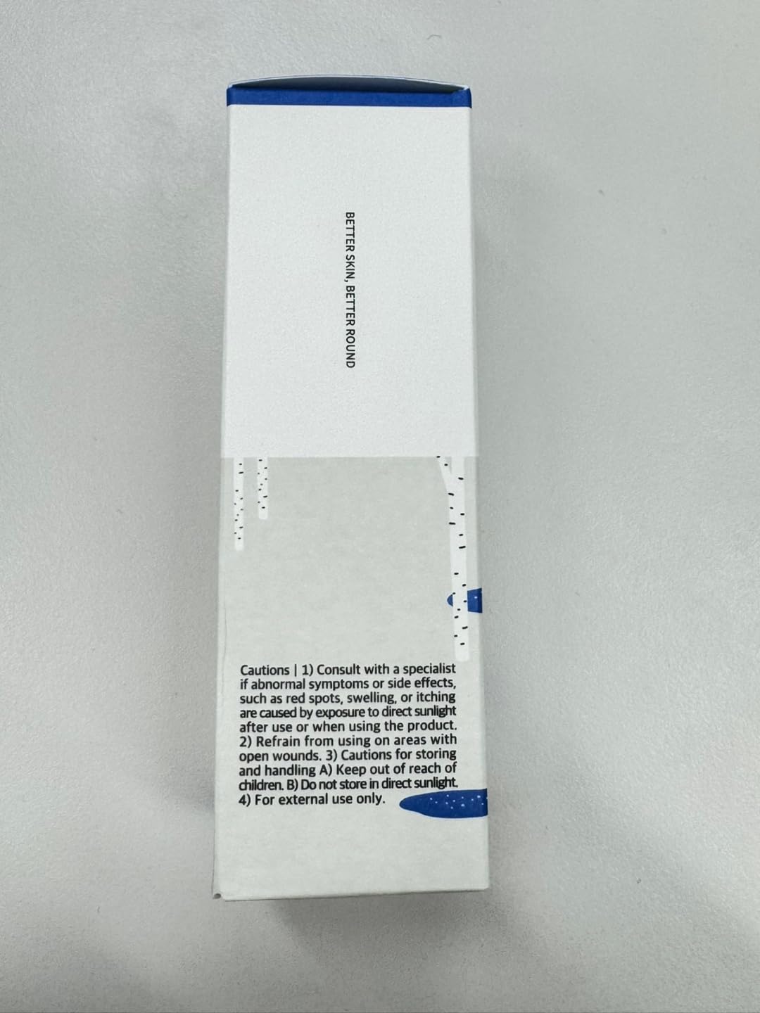 ROUND LAB ampoule on vanity styled with skincare for layering benefit