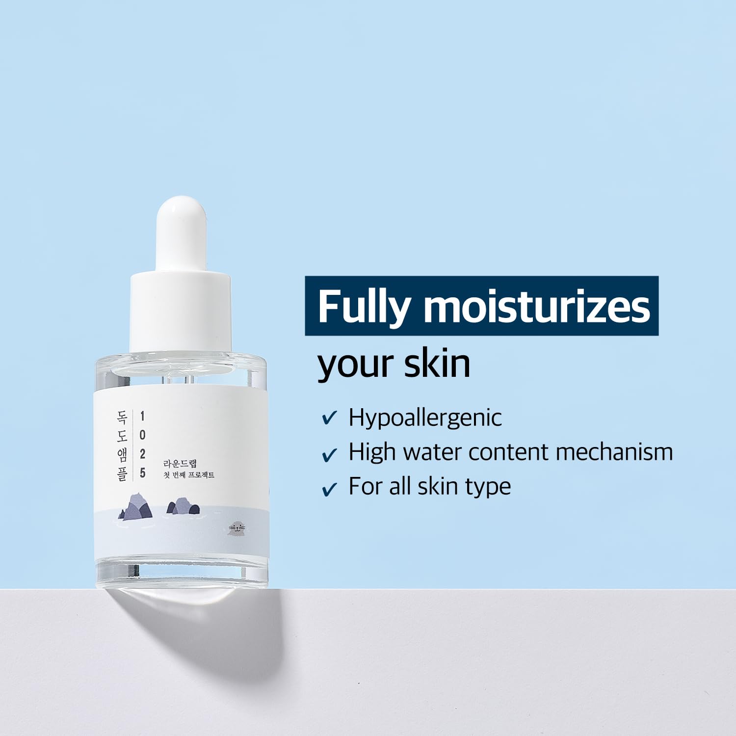 ROUND LAB dropper close-up dispensing a clear hydrating drop for quick absorption
