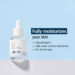 ROUND LAB dropper close-up dispensing a clear hydrating drop for quick absorption