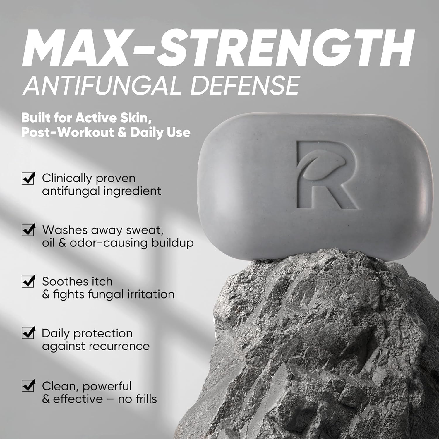 Roycederm soap bar close-up texture highlighting charcoal and volcanic ash cleaning power