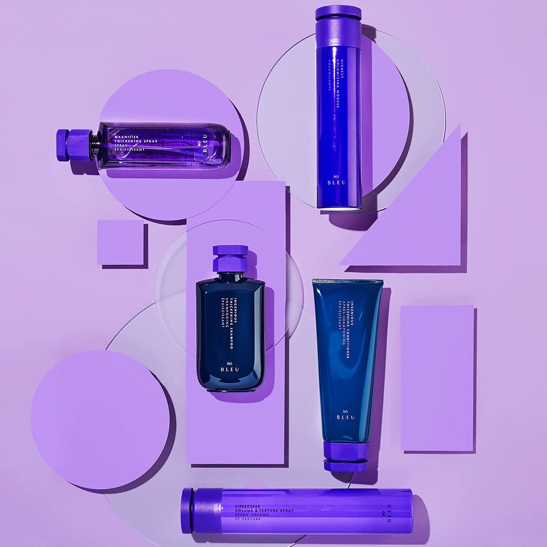 R+Co BLEU Highest on model styled hair showing voluminous, shiny finish and movement
