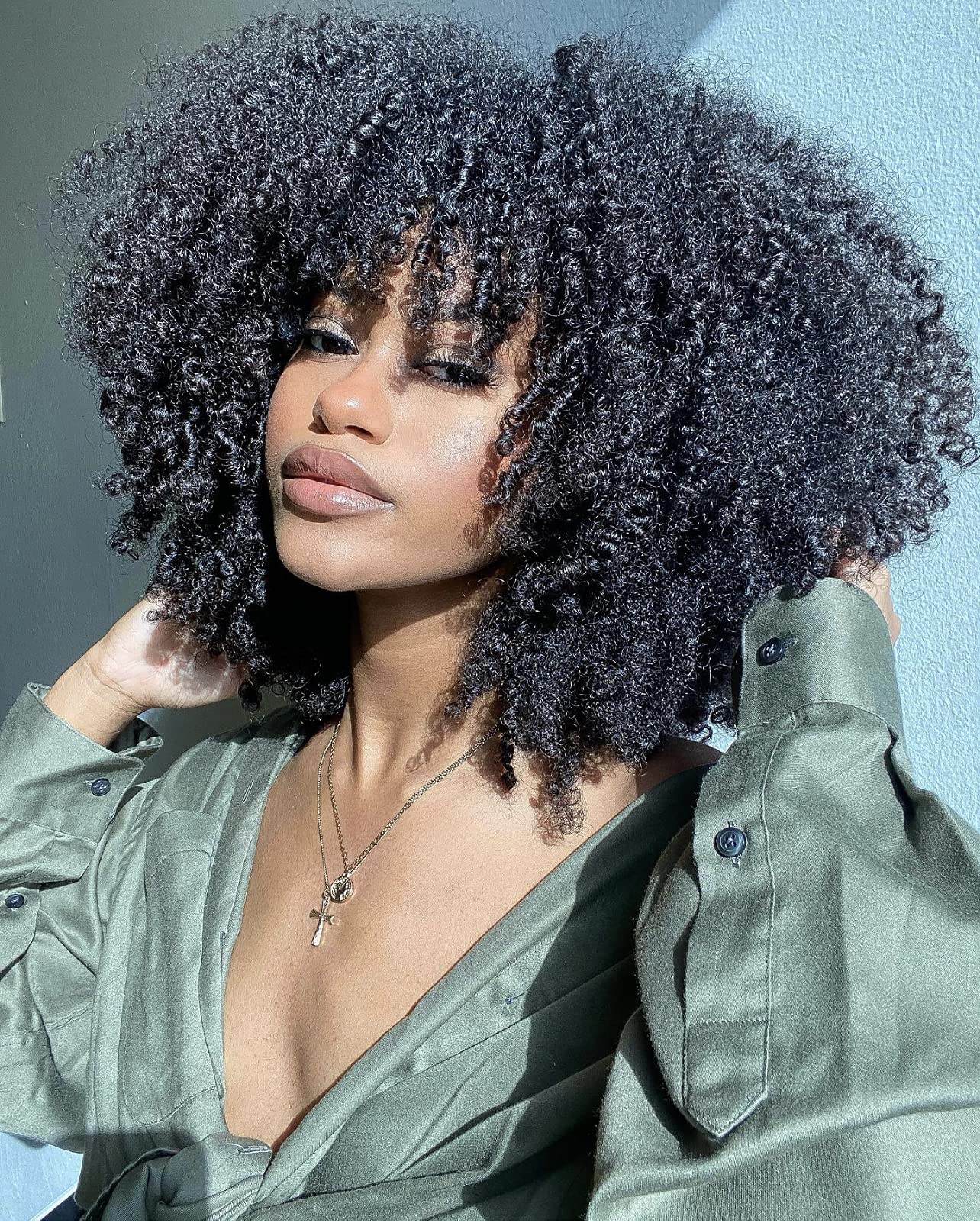 RunM front view short curly afro wig showing natural volume and shape benefit