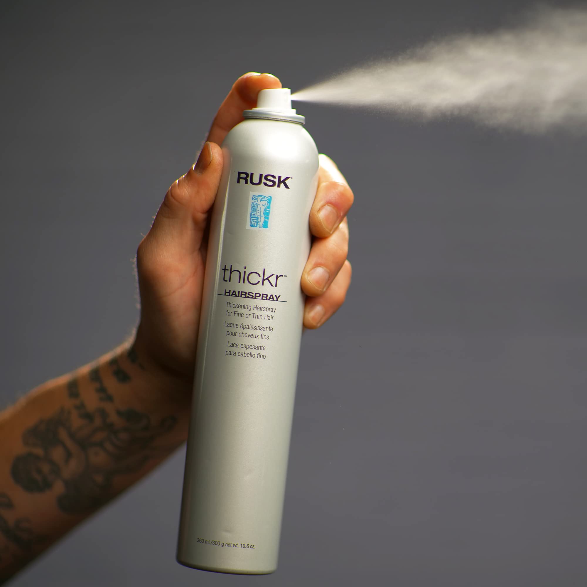 RUSK in-studio styling scene showing salon professionals creating lift and shine