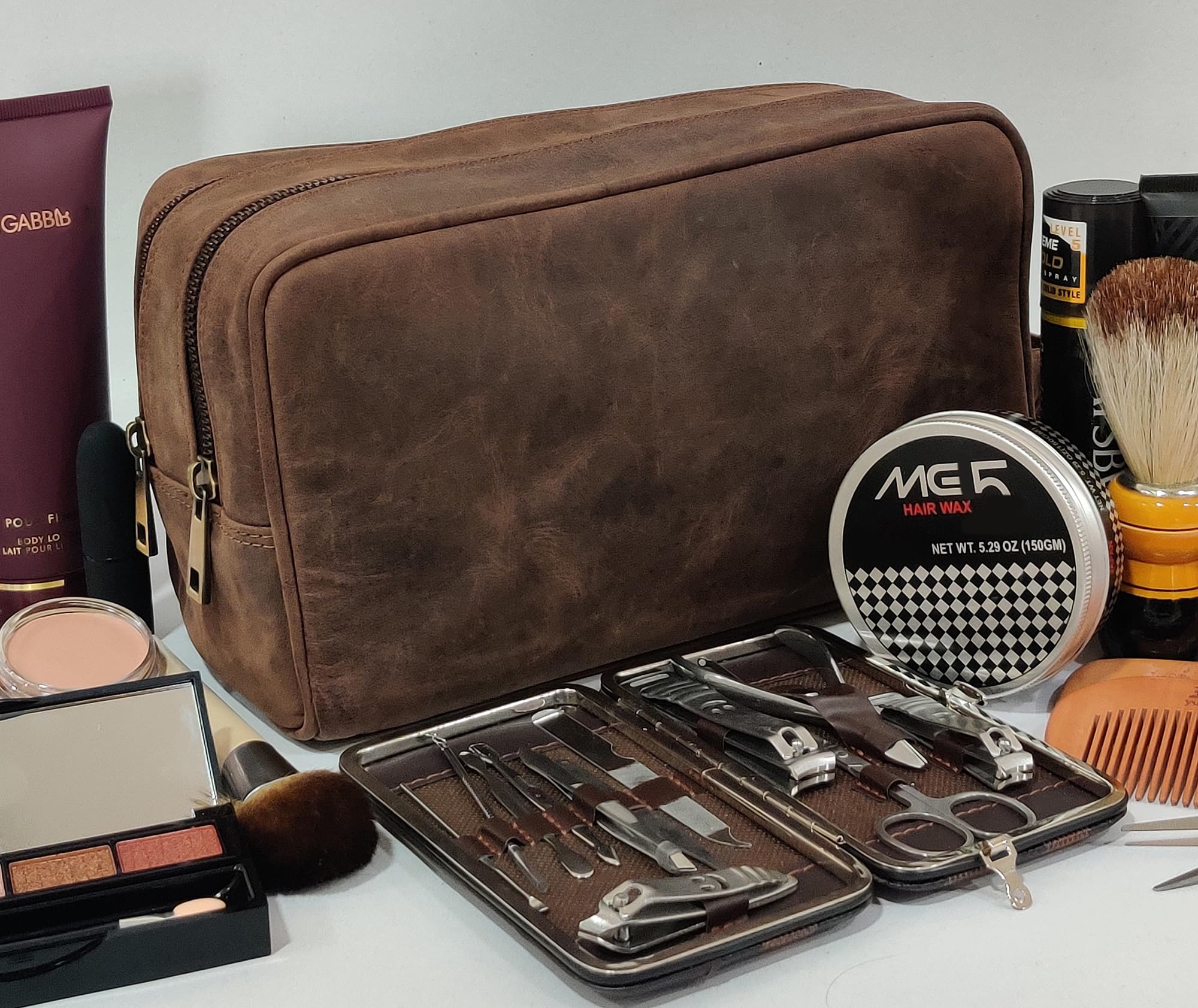 RUSTIC TOWN toiletry bag in travel scene showing stylish organization on the go benefit