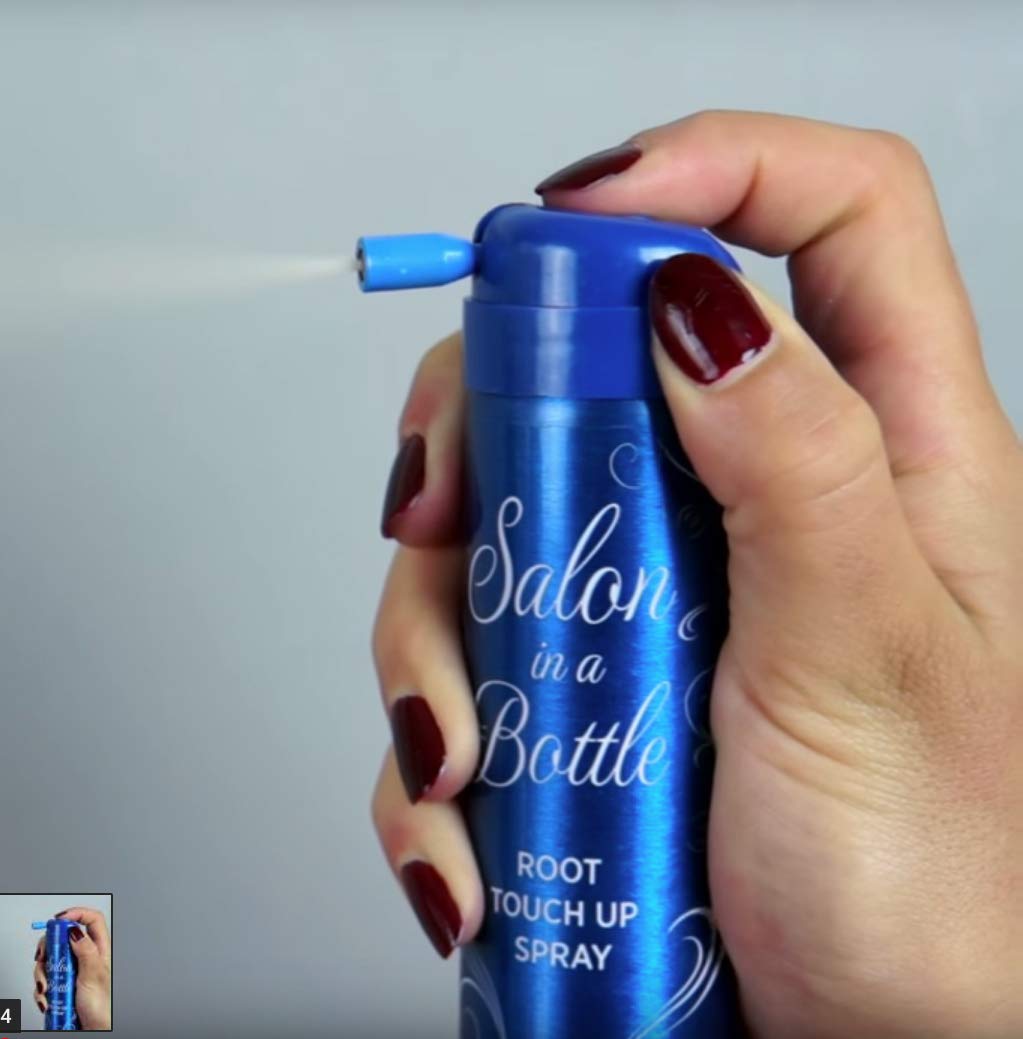 Salon in a Bottle can in hand for scale highlighting portability and travel-friendly benefit