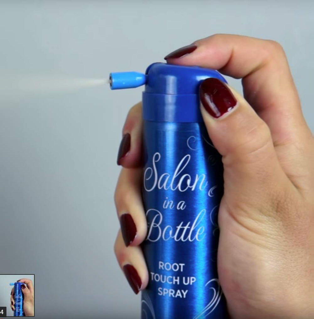 Salon in a Bottle can in hand for scale highlighting portability and travel-friendly benefit