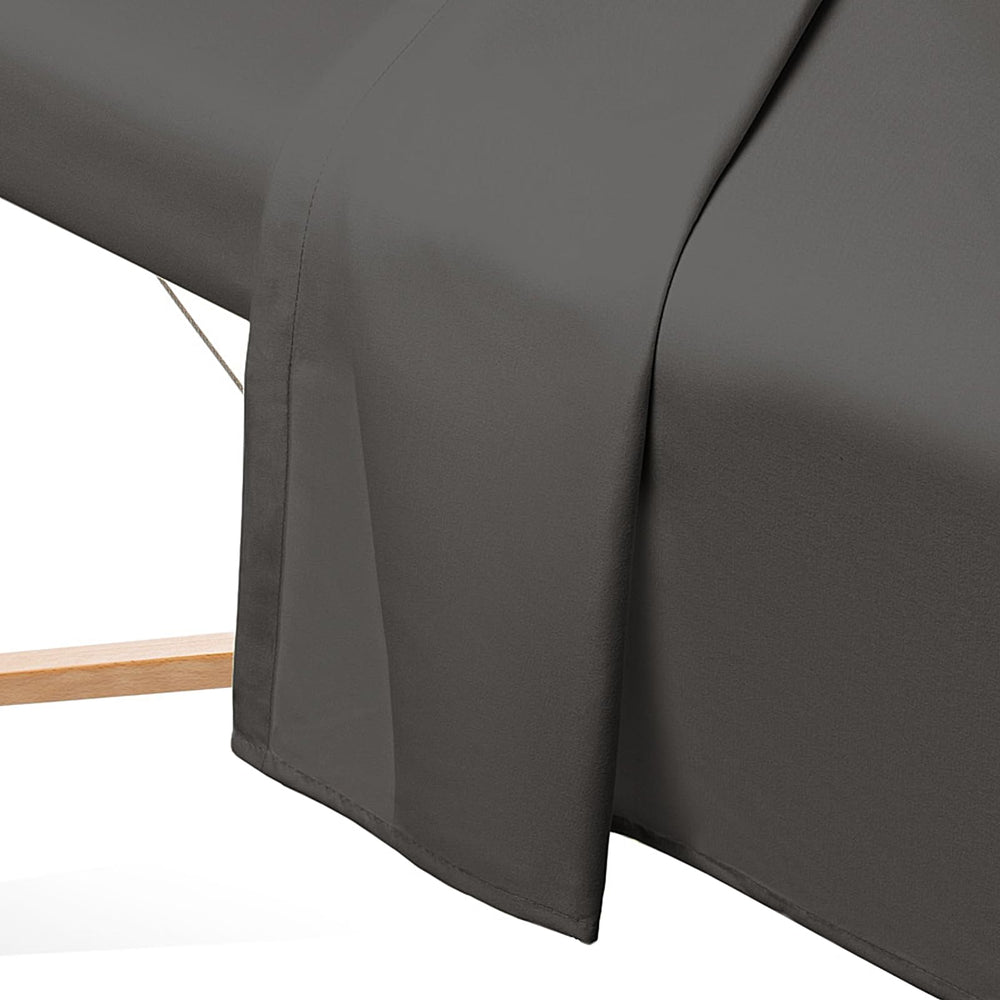 Saloniture face cradle cover on crescent pillow for hygienic, comfortable support