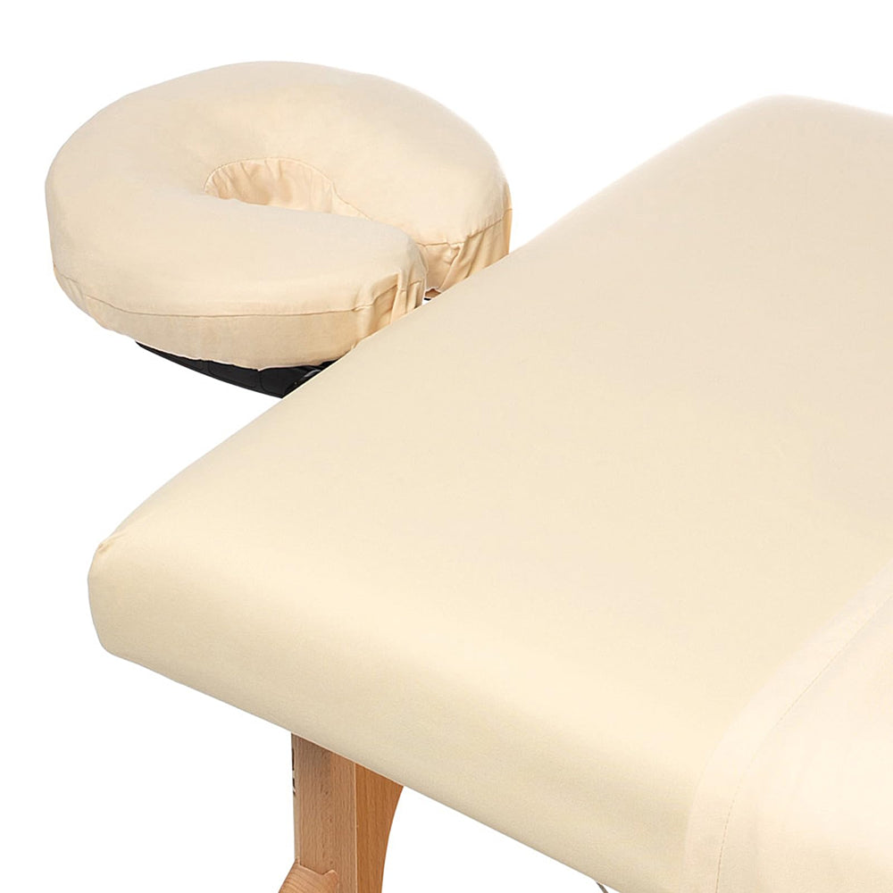 Saloniture fitted sheet stretched over table demonstrating secure elastic fit