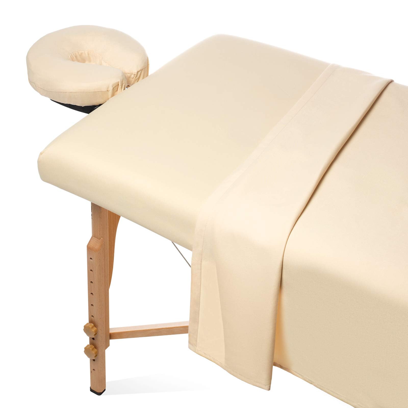 Saloniture sheets on massage table showing complete set and professional look