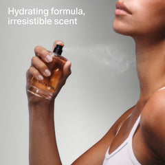 Salt & Stone mist held in hand to show size and portability for easy travel and daily use.