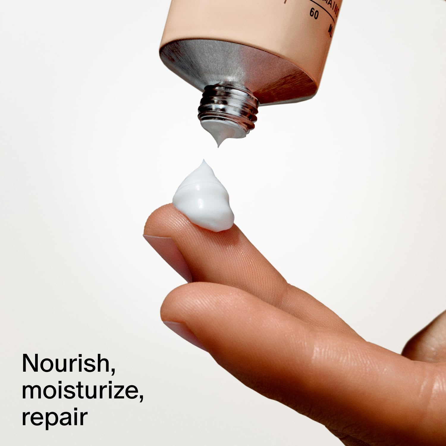 Salt & Stone next to keys and phone illustrating 2 fl oz travel-friendly size