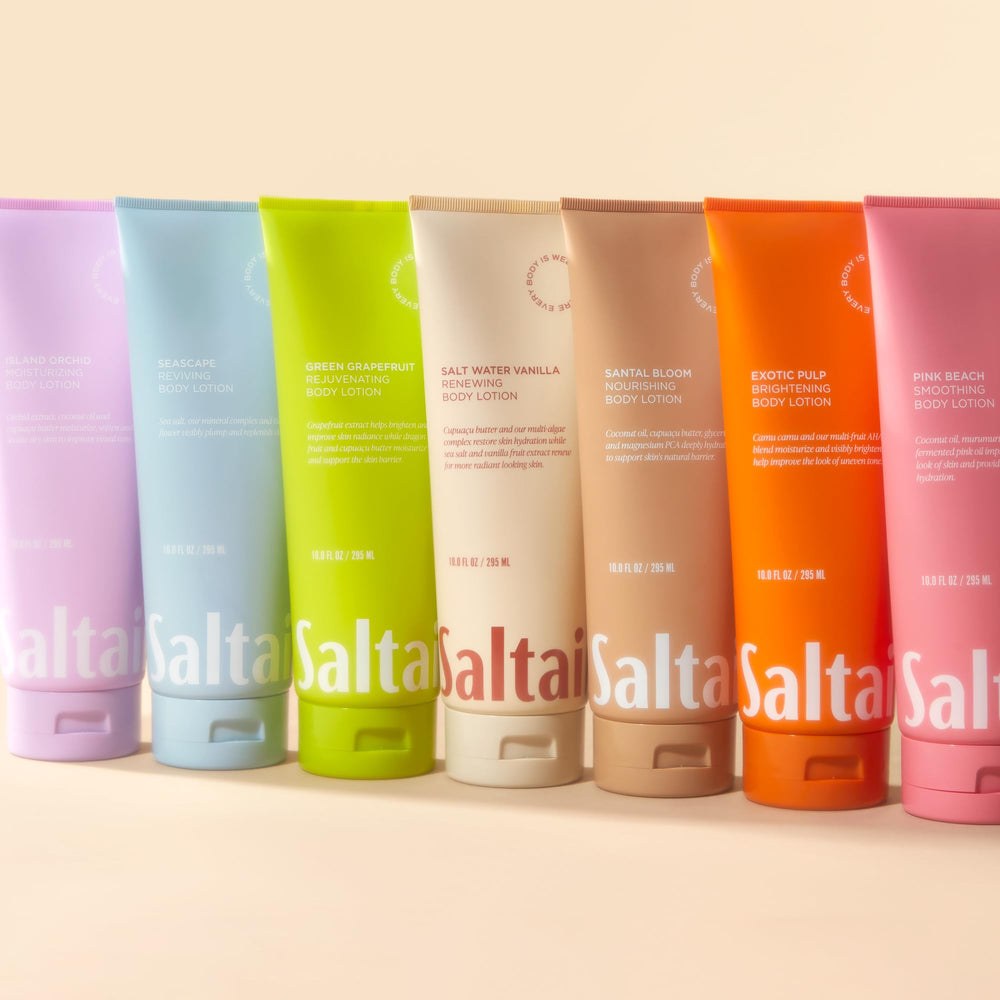 Saltair Pink Beach tub next to beach towel suggesting travel-friendly scent