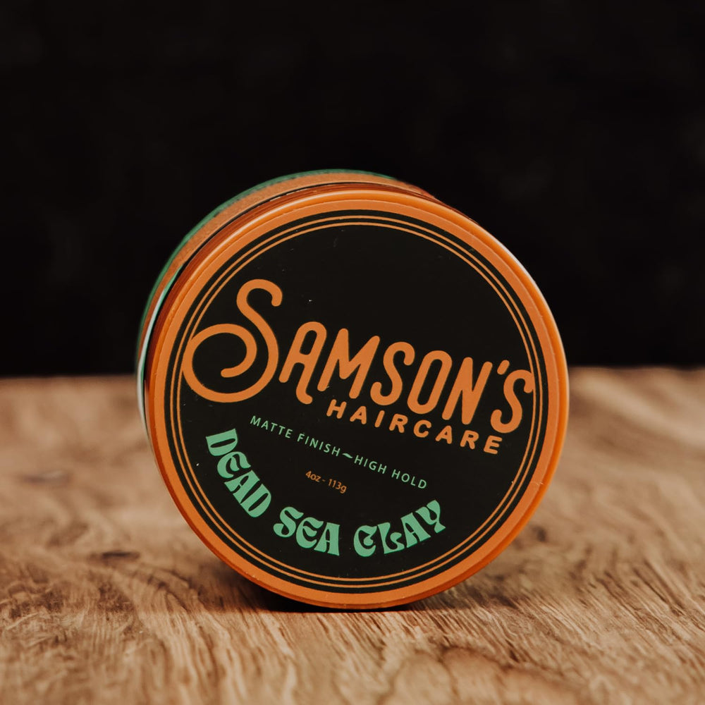 SAMSON'S HAIRCARE clay on fingers demonstrating easy application and control