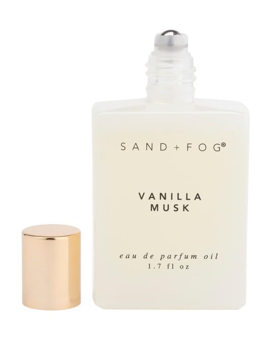Sand + Fog rollerball close-up on wrist demonstrating precise, mess-free application
