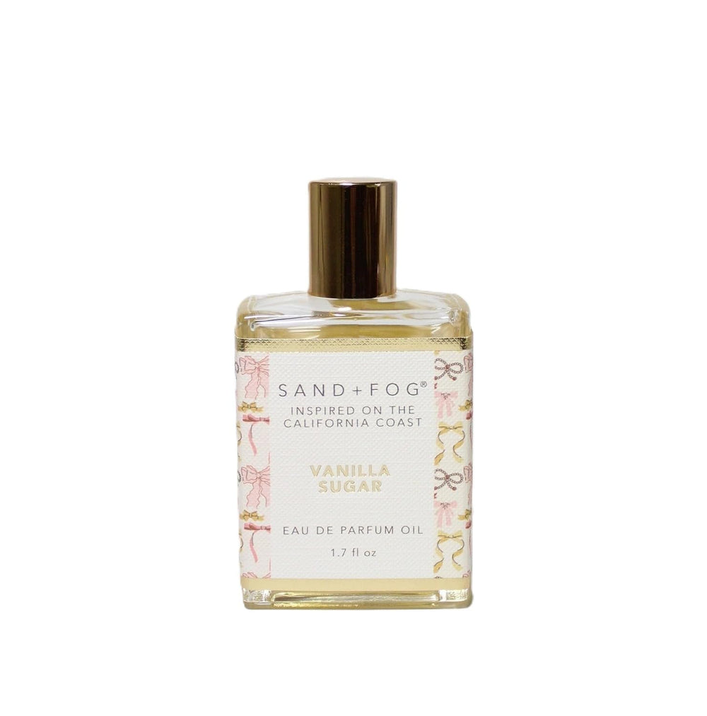 Sand + Fog front bottle with pink and gold accents showing elegant design and travel benefit