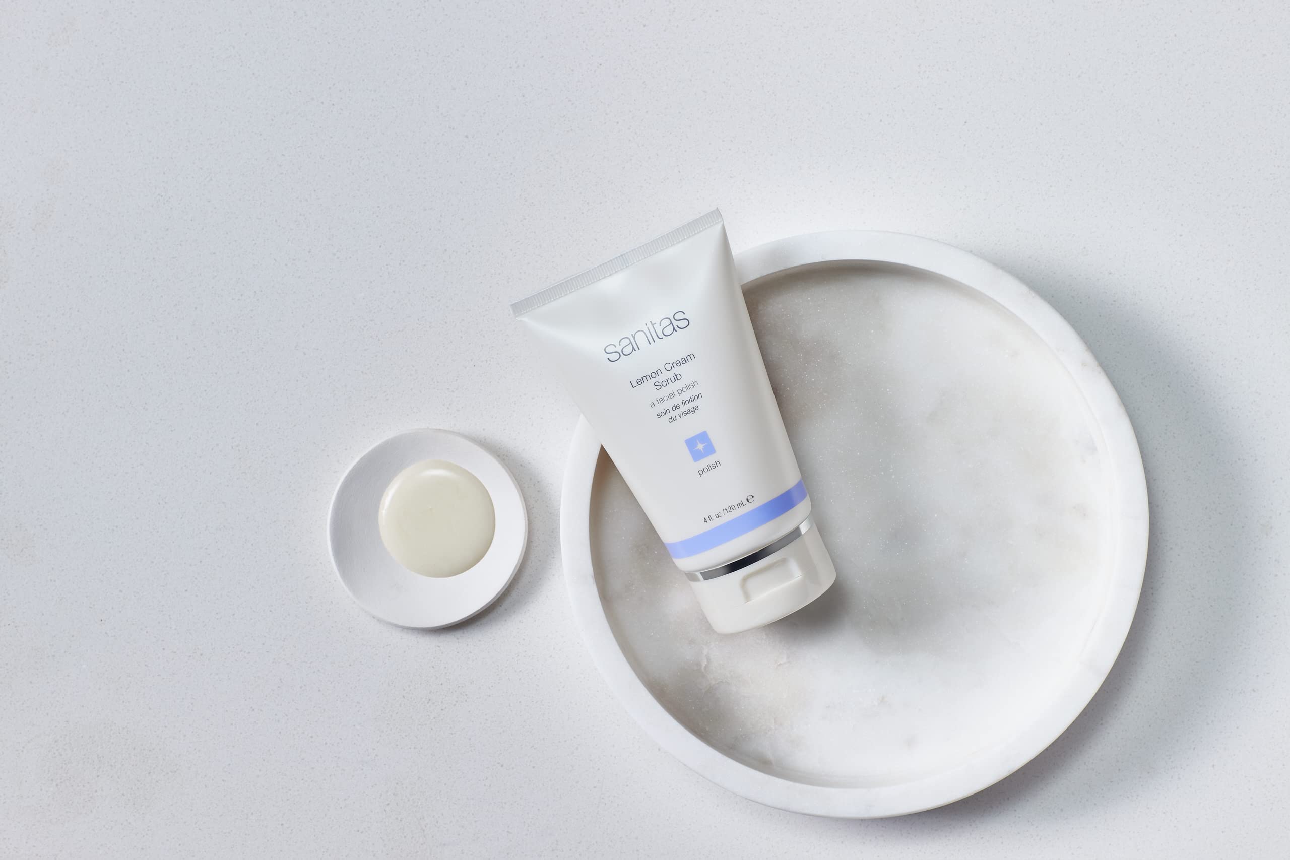Sanitas texture closeup revealing creamy scrub and ultra-fine silica crystals for gentle exfoliation