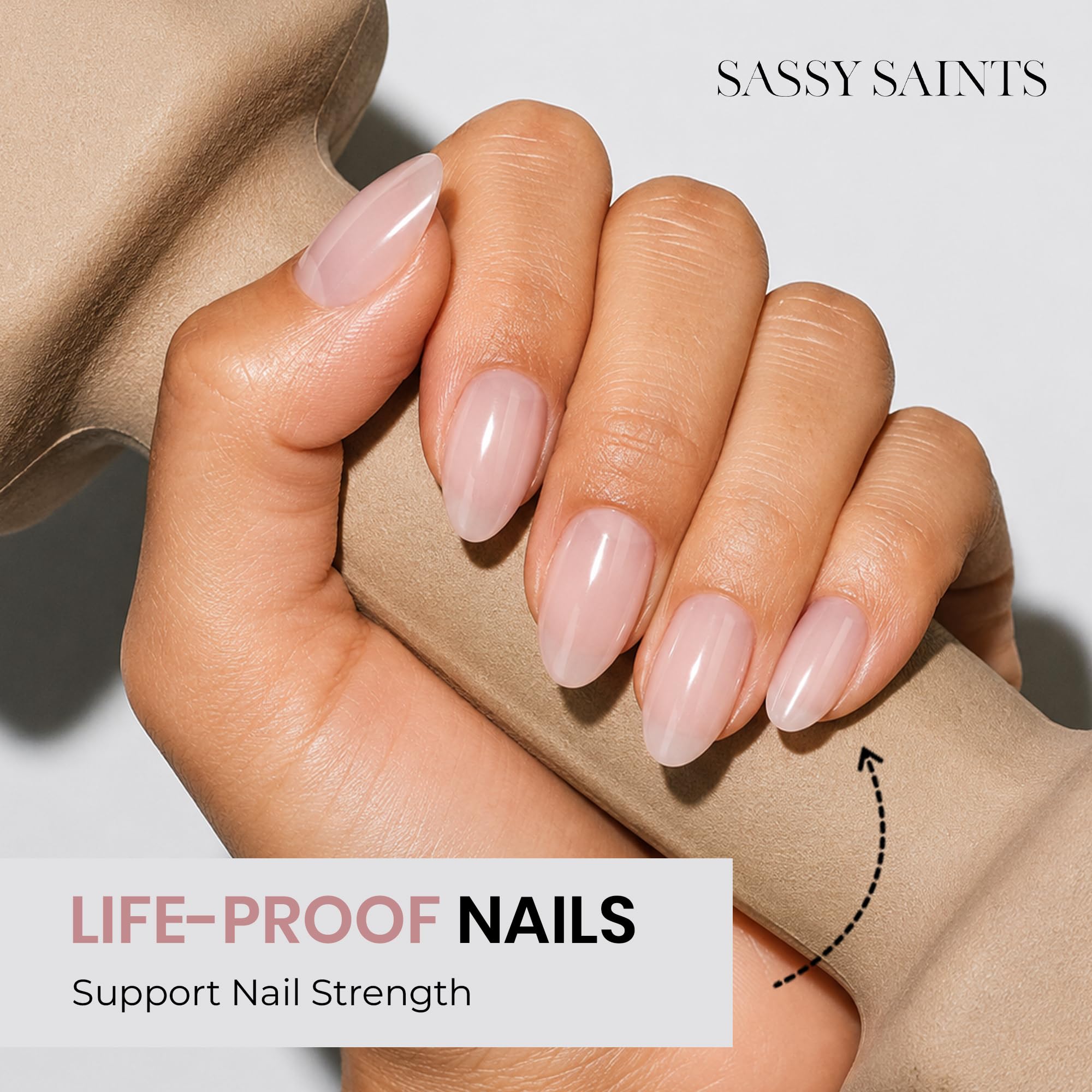 Sassy Saints on nails under studio light demonstrating chip-resistant salon finish