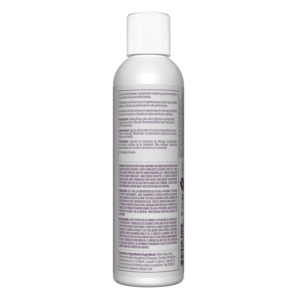 Satin developer in stylist hands applying color demonstrates control and shiny finish benefit