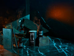 Scentbird John Wick bottle in evening outfit setting conveying confident presence