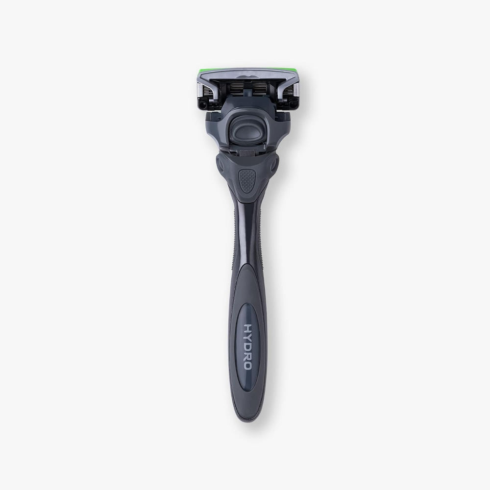 Schick Hydro in bathroom setting showing complete grooming-ready kit