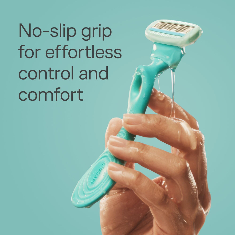 Schick Hydro Silk razor in hand demonstrating control and gentle shave