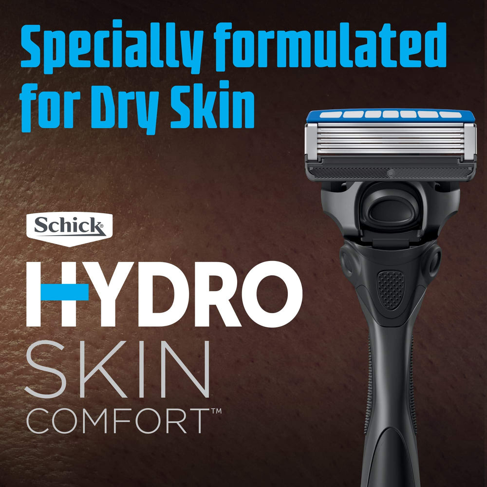 Schick Hydro size comparison with hand to show cartridge scale and travel convenience