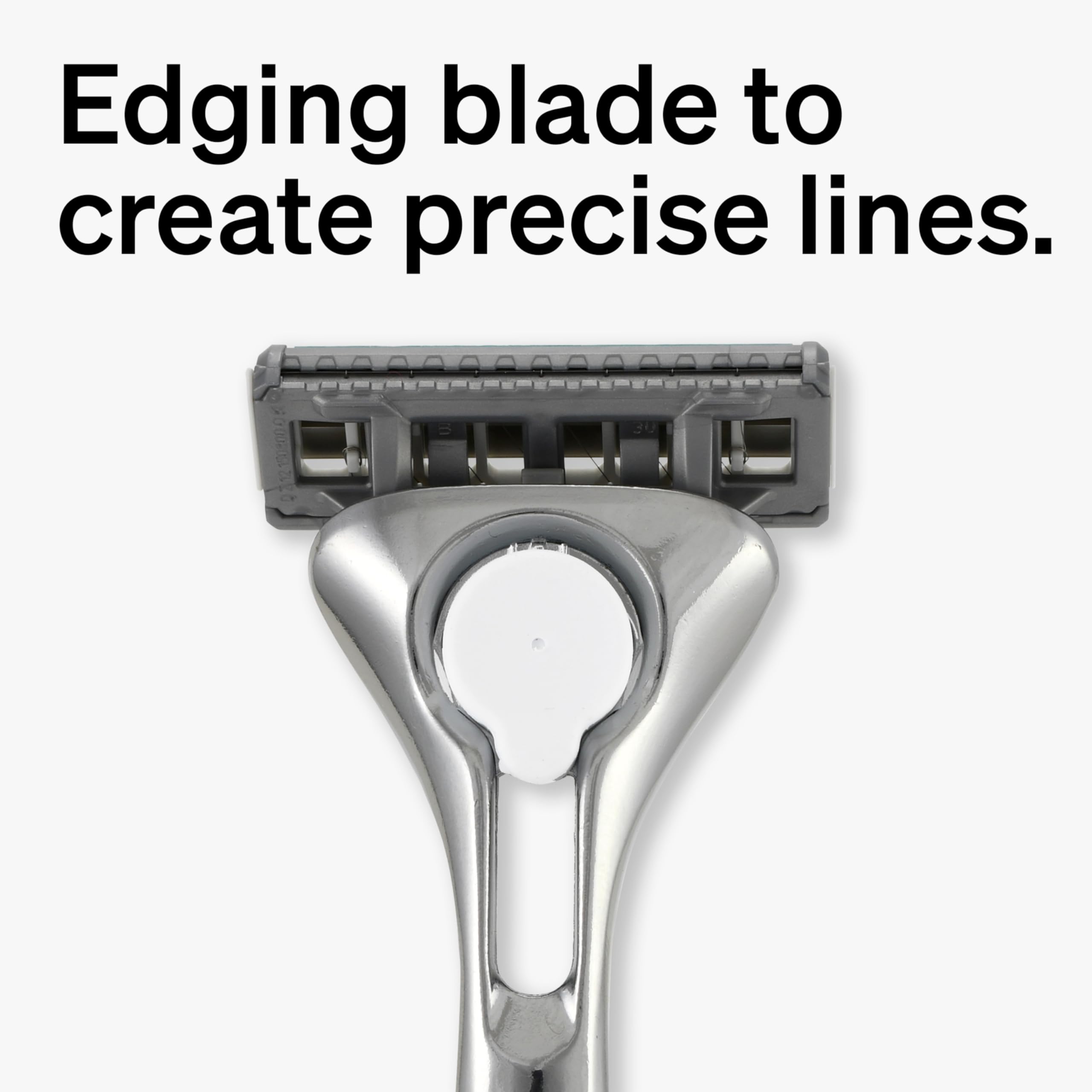 Schick Quattro Titanium lubricating strip close-up for smoother shaving glide