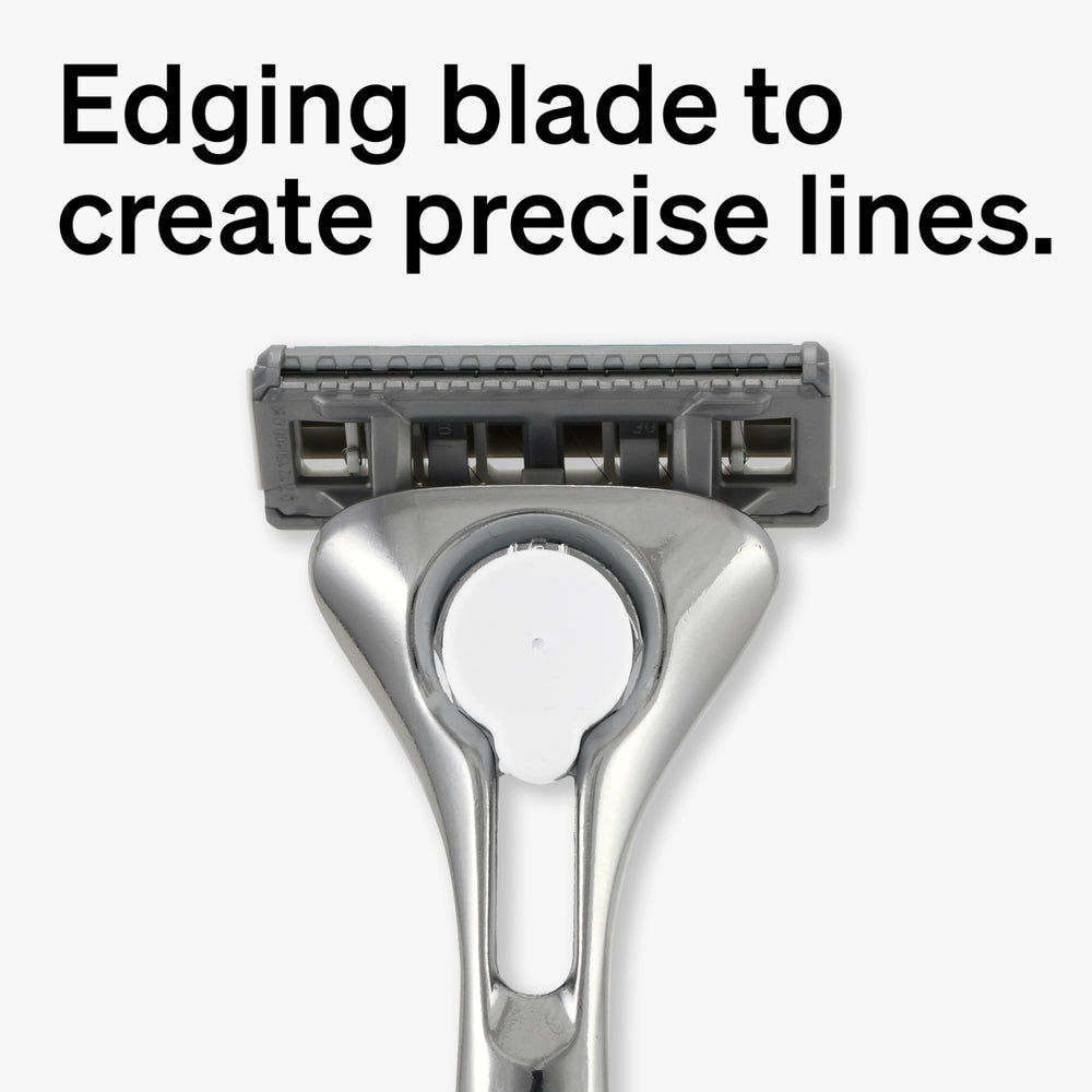Schick Quattro Titanium lubricating strip close-up for smoother shaving glide