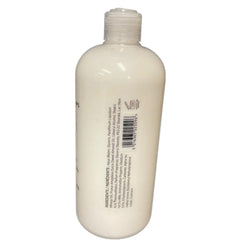 Scottish Fine Soaps Au Lait lotion in hand demonstrating moisturizing benefit and quick absorption