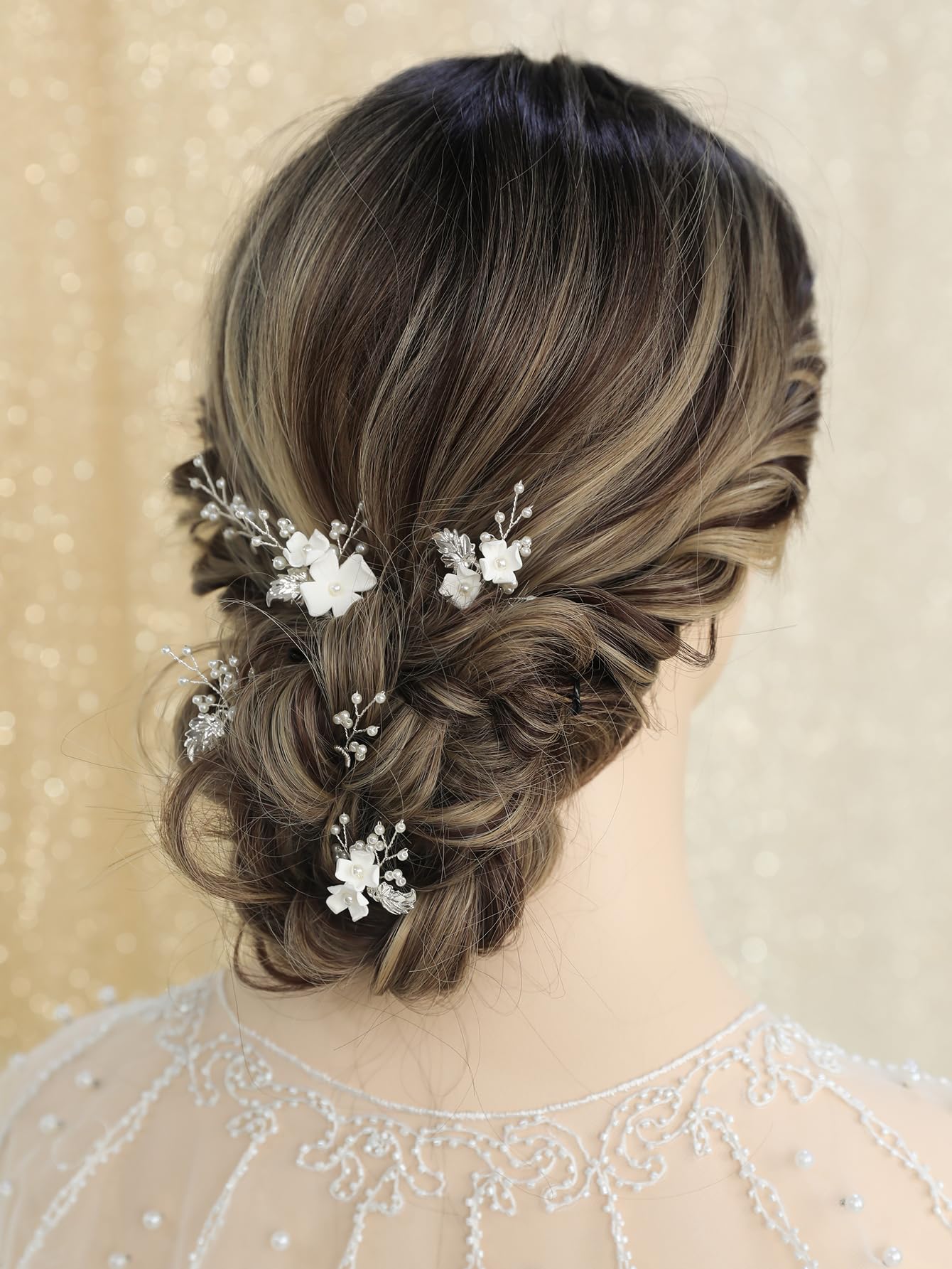 SELFCLOUD hair pins placed in bride updo, adds elegant sparkle to hairstyle