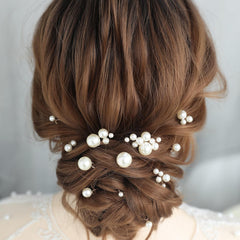 SELFCLOUD pins styled in bridal updo showing secure hold benefit