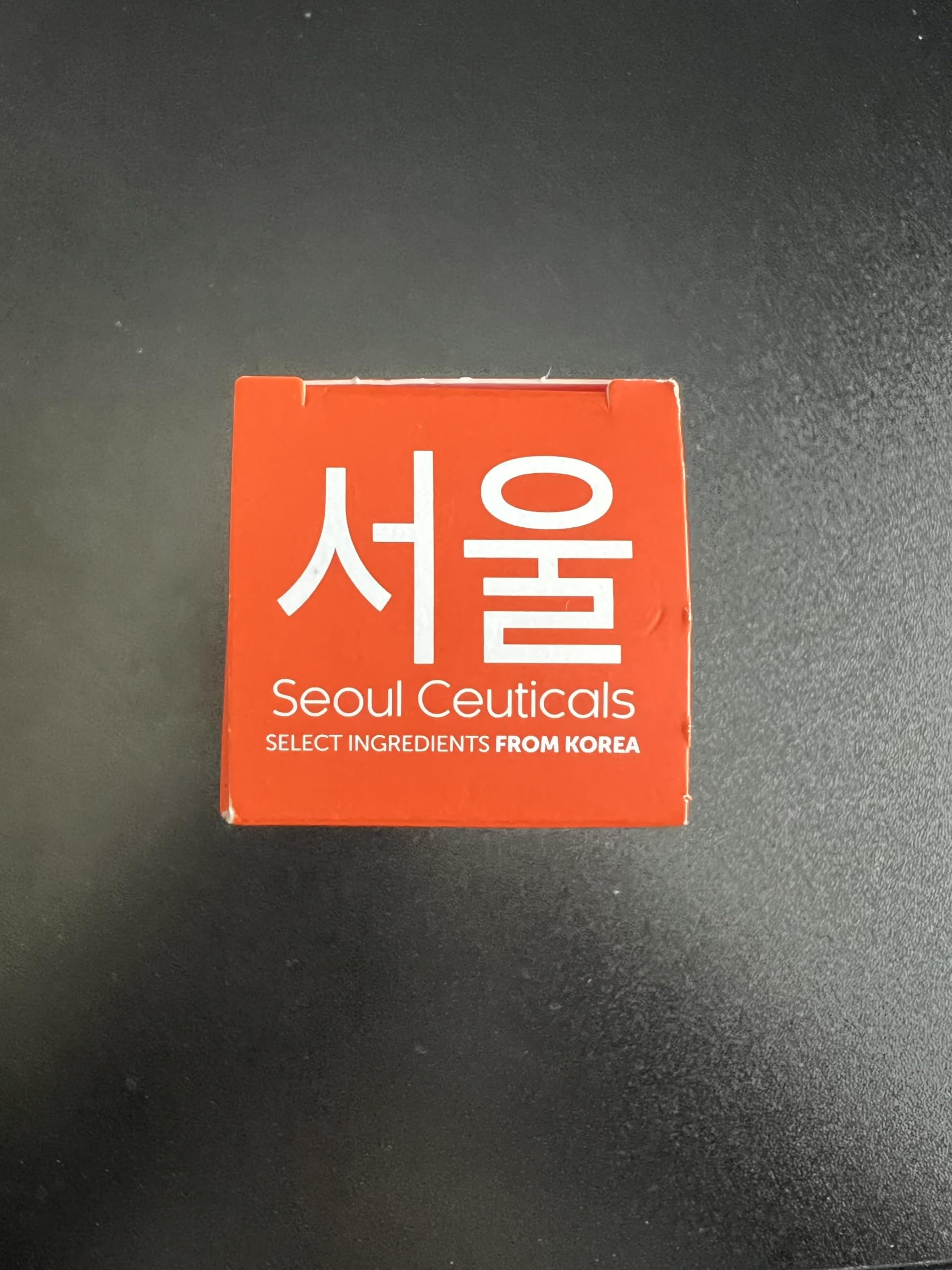 Serum drops on skin demonstrating SeoulCeuticals fast absorption and glow