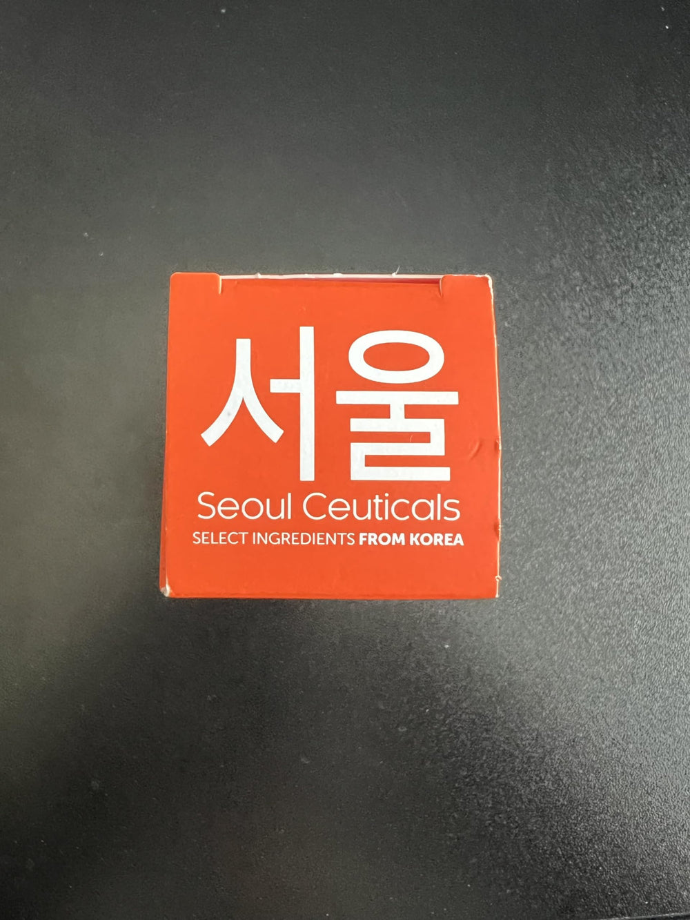 Serum drops on skin demonstrating SeoulCeuticals fast absorption and glow