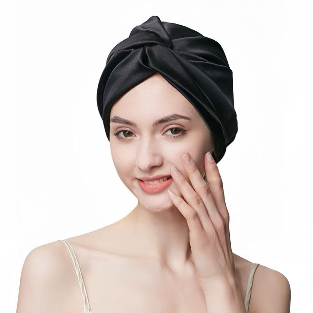 SereLune front view black bonnet showing full coverage and smooth finish for overnight protection
