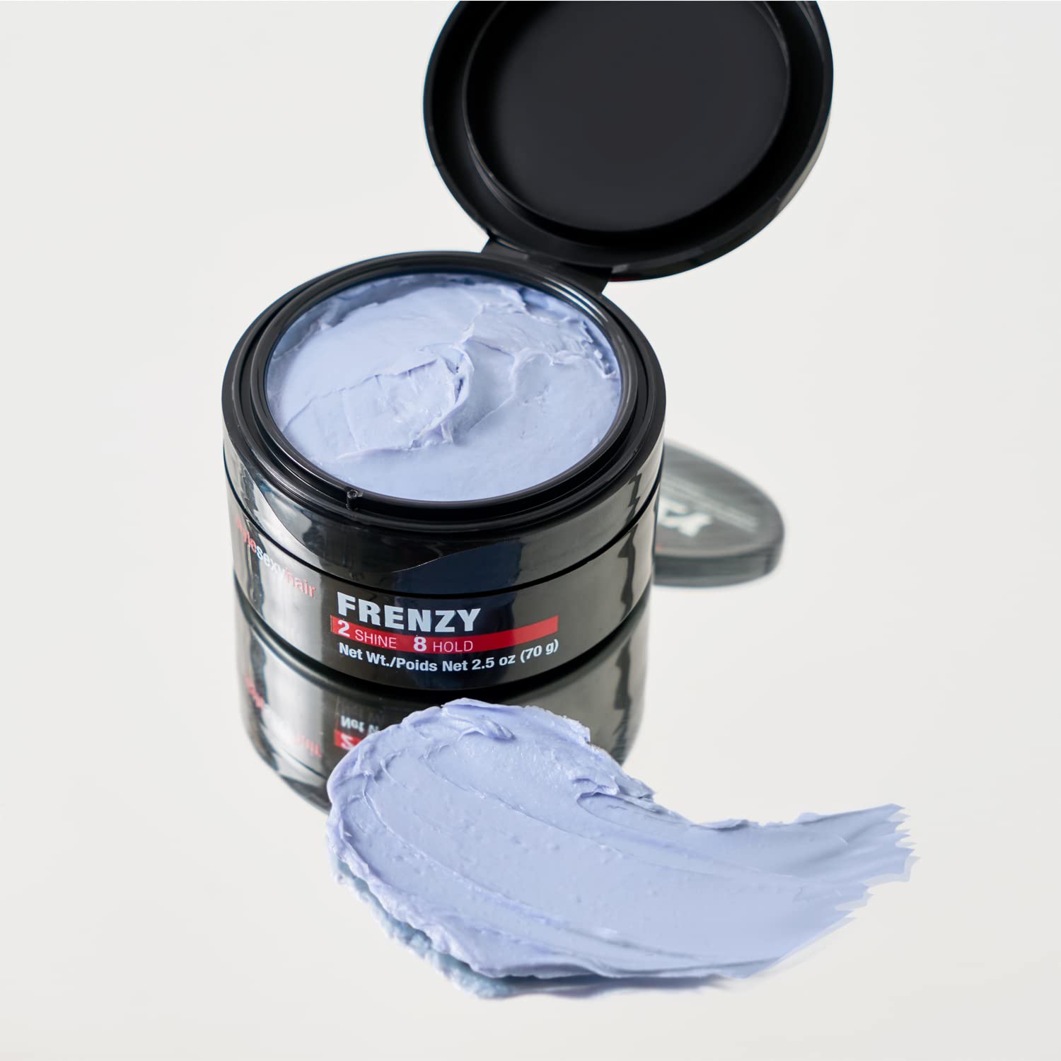 SexyHair paste being warmed in hands to improve spreadability and styling control
