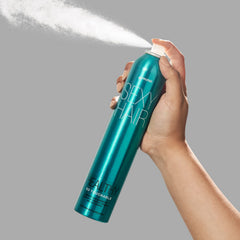 SexyHair fine mist dispersing over hair for weightless hold and natural movement