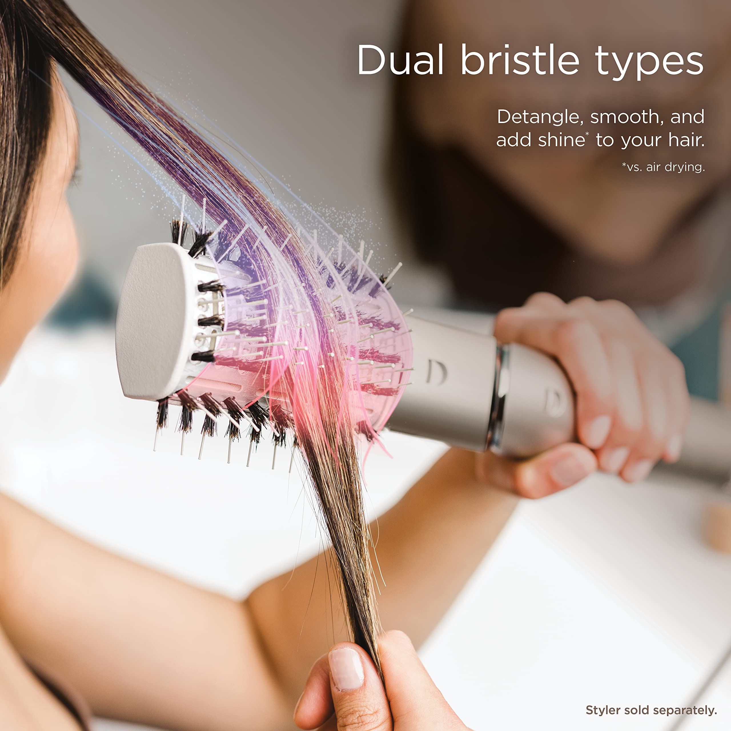 Shark paddle brush close-up of boar and plastic bristles for smooth shiny hair
