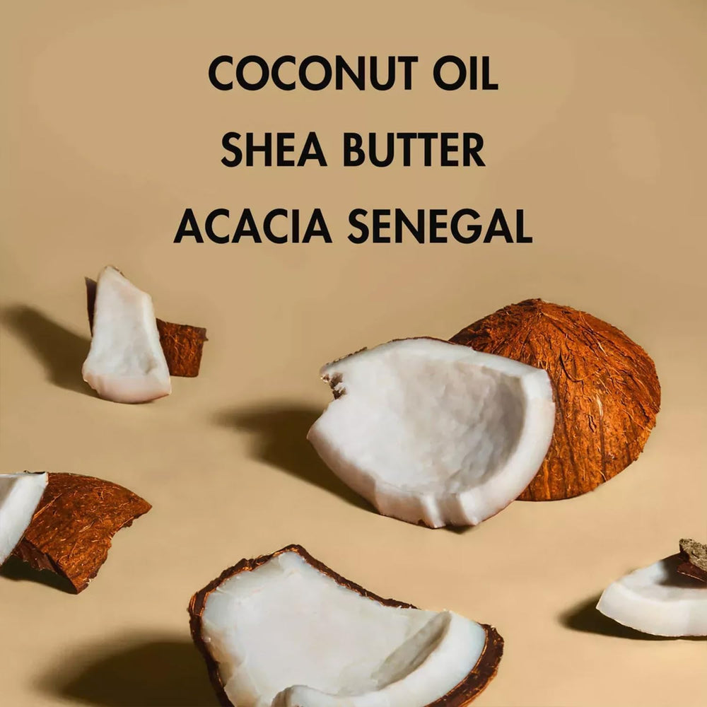 Shea Moisture ingredient display with coconut milk, shea, jojoba and Acacia Senegal highlighting natural benefits