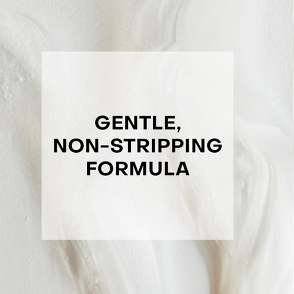 Shea Moisture conditioner being combed through hair improving manageability