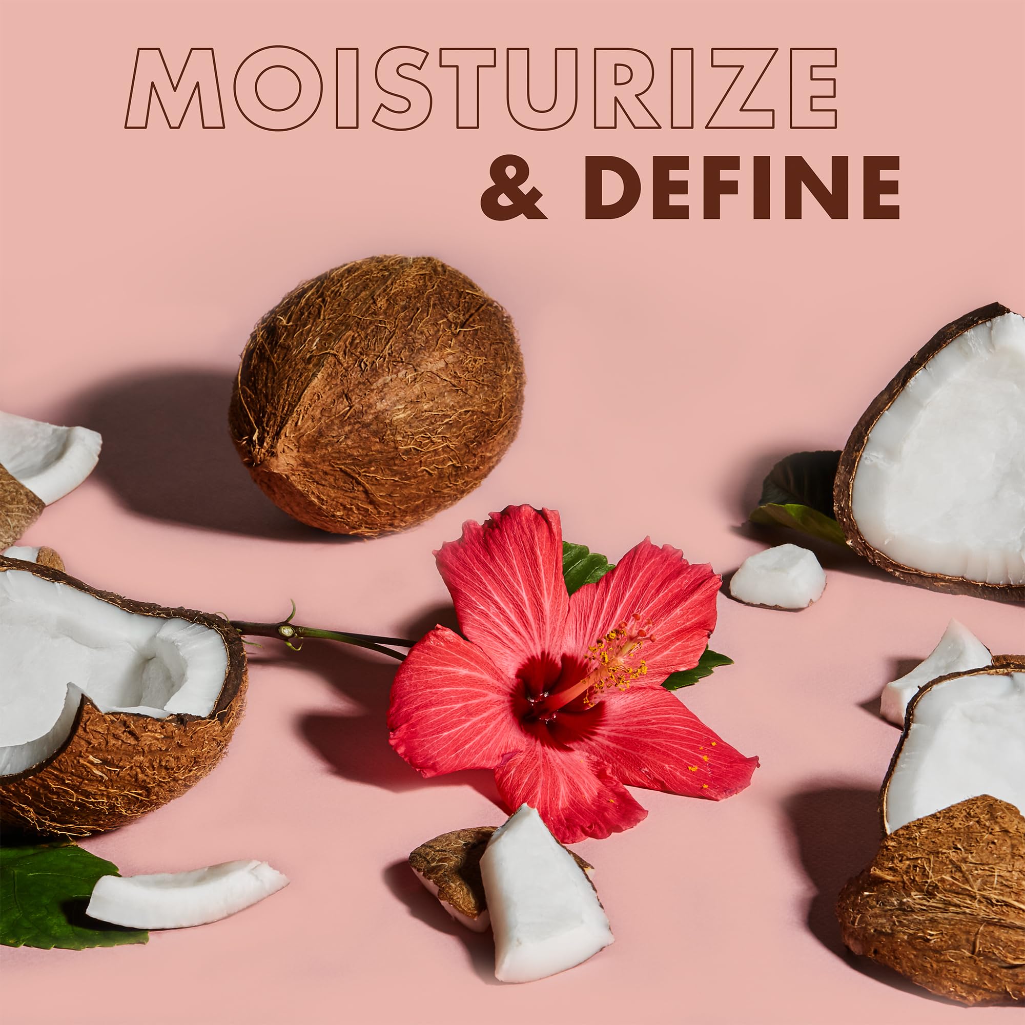 SheaMoisture Hold & Shine Moisture Mist misting on hair to add moisture and manageability
