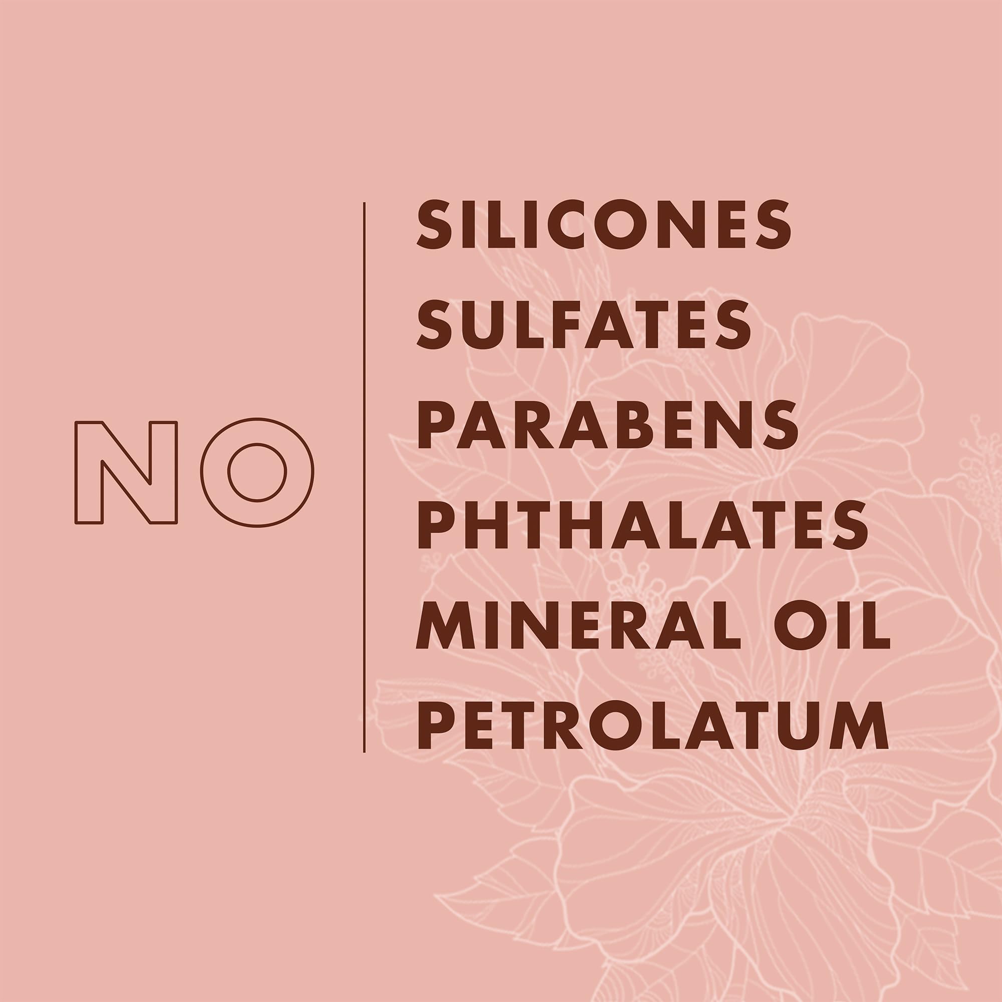 SheaMoisture label close-up highlighting coconut oil, silk protein, and neem oil benefits