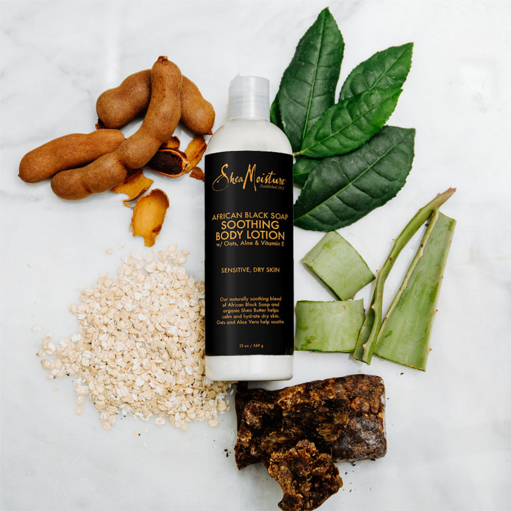 SheaMoisture bottle on bathroom shelf showing daily routine use
