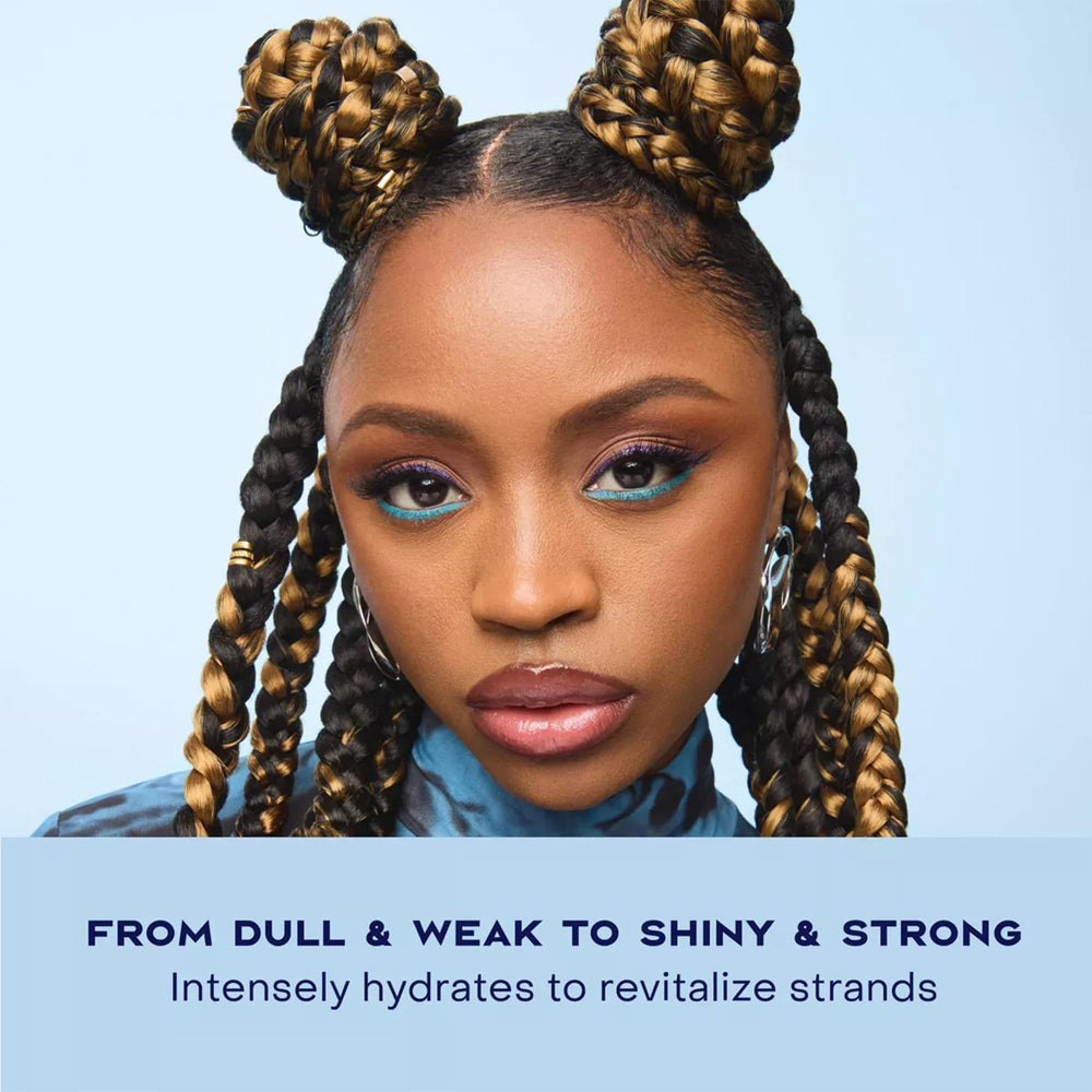 SheaMoisture conditioner back label highlighting nourishing ingredient benefits