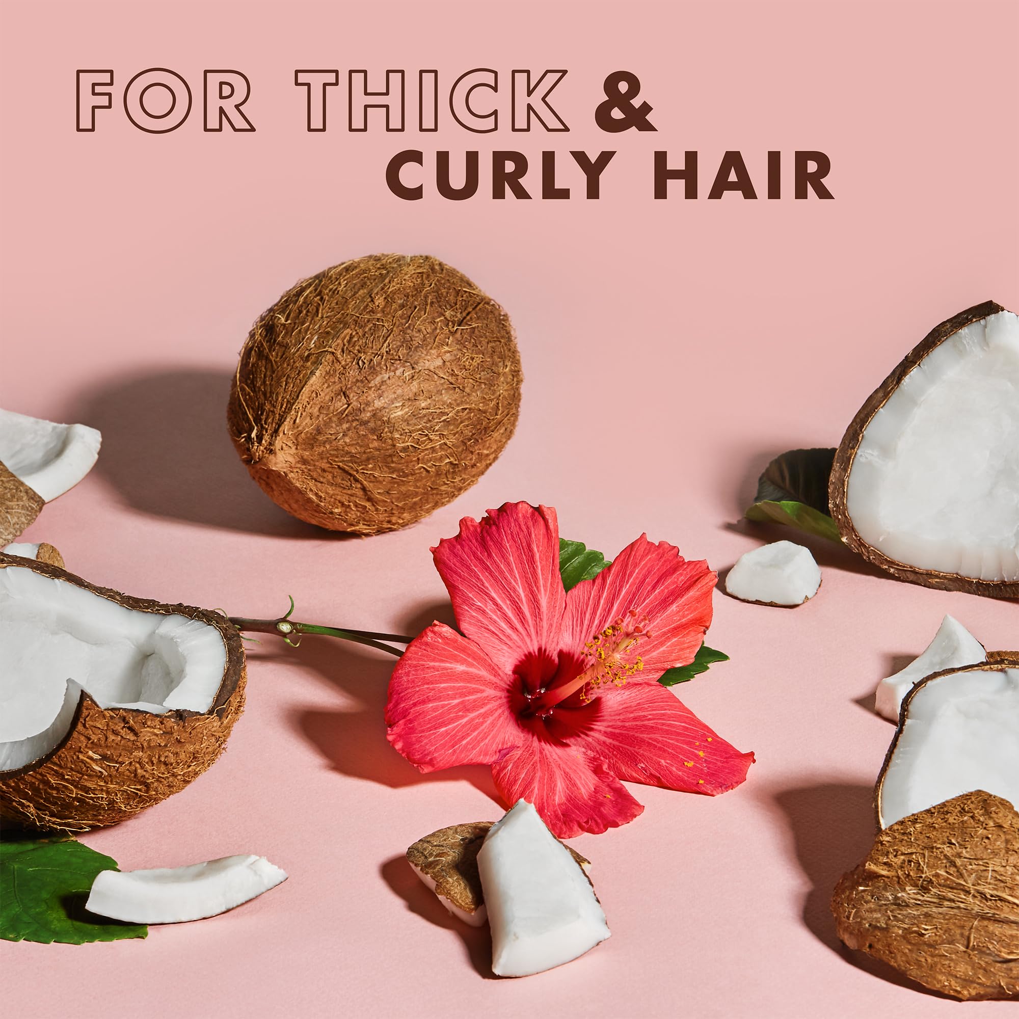 Shea Moisture bottles in hand showing 3.2 oz size for airline-friendly convenience benefit