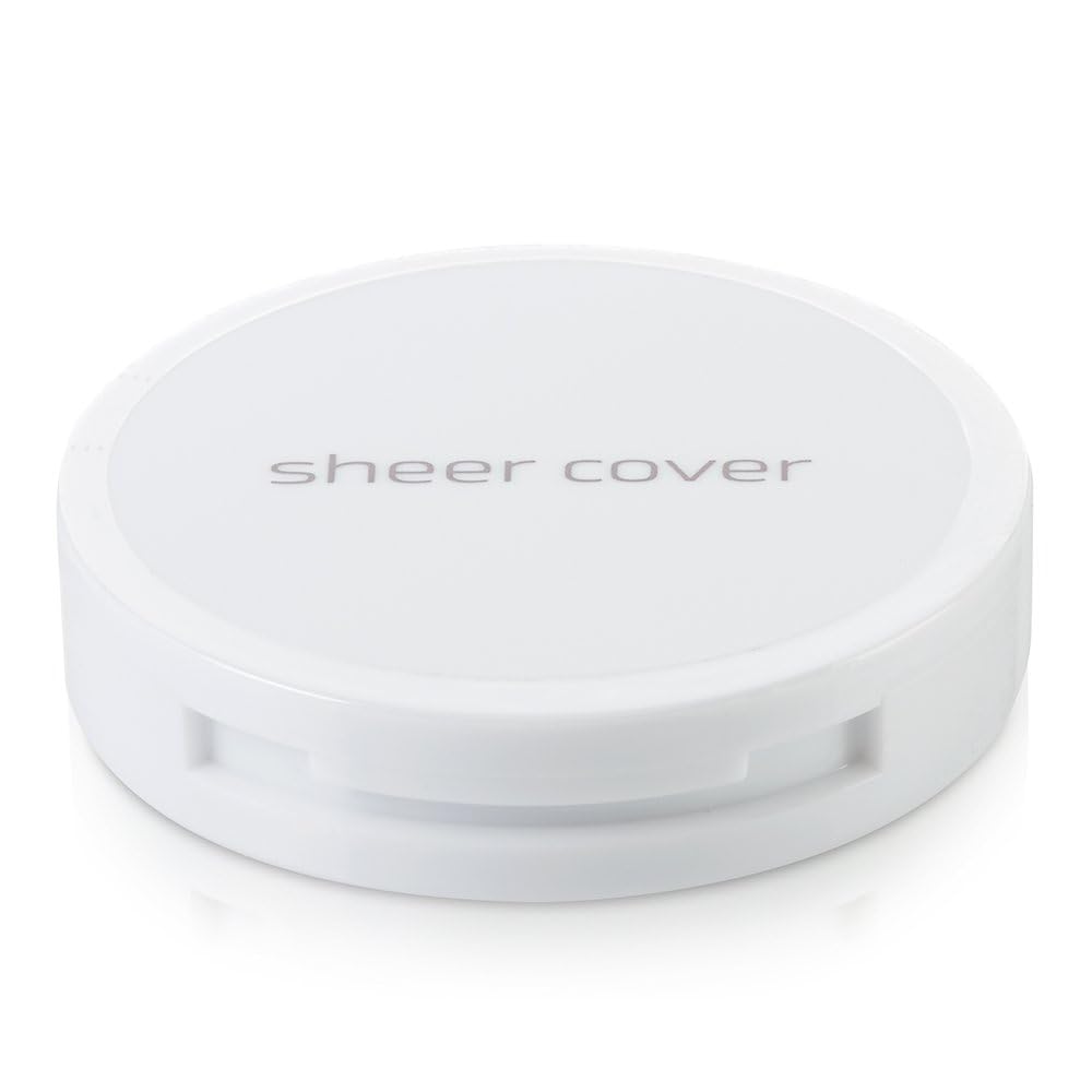 Sheer Cover open compact with brush showing precise application benefit