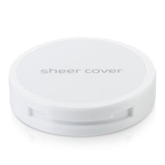 Sheer Cover open compact with brush showing precise application benefit